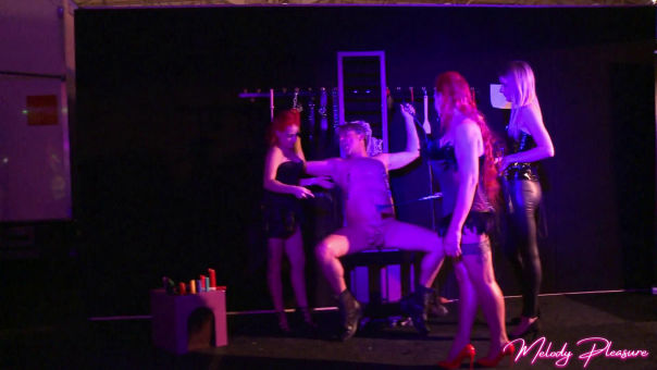 Sebastian Rolls live at erotic event the slave of 3 girls